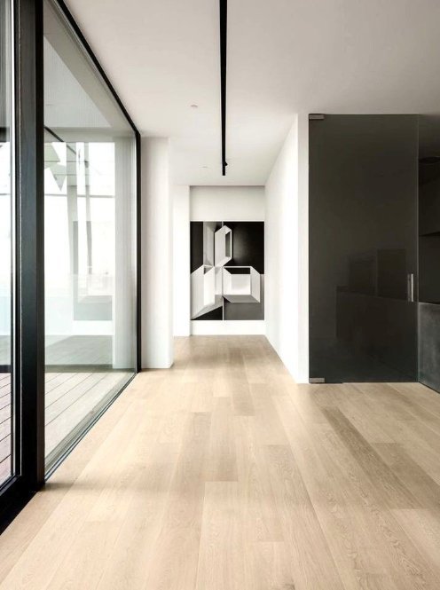 Modern apartment hallway with light SPC flooring